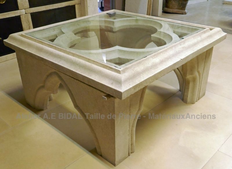 Indoor furniture by Alain Bidal, stone cutter in Provence : coffee table in carved limestone