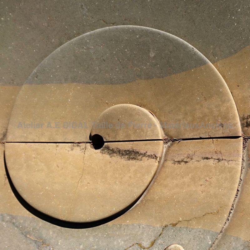 Spiral carved by hand on the basin of our central fountain crafted in Burgundy stone - Atelier Bidal, Provence.