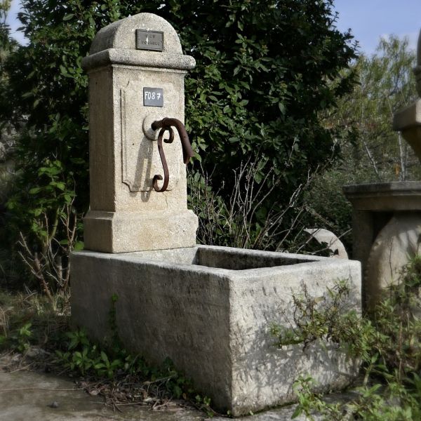 Provencal fountain with trough for outdoor use | Wall fountain by the stonemason Alain Bidal (Provence).
