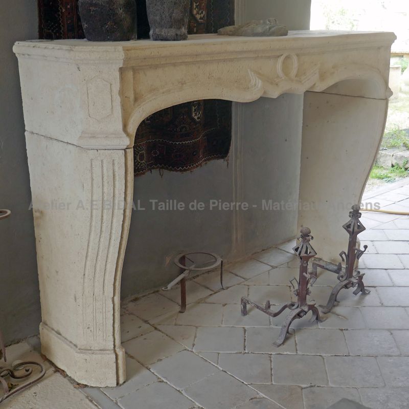 Large Louis XV mantelpiece carved in white limestone by the stonemason Alain BIDAL (Provence)