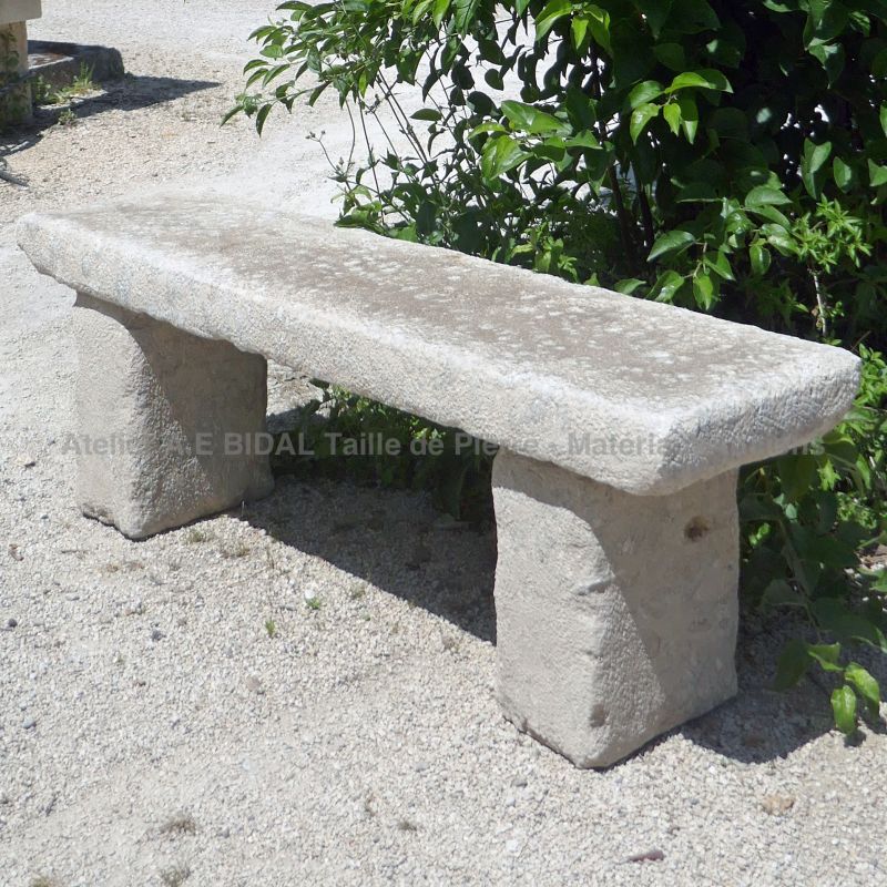 Bench in natural stone for outdoors by the stone cutter Atelier Alain Bidal, Provence